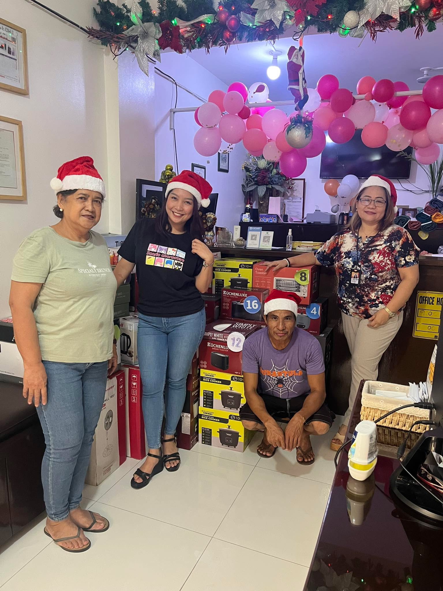 Staff holding a raffle